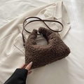 Dark brown plush teddy fur tote bag with leather strap on a beige blazer background - Large / Brown