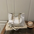 White large capacity tote bag with pleated texture and gold chain strap on table - With Pendant / White