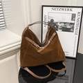 Retro brown suede tote bag for women with leather straps in a minimalist indoor setting - Brown