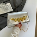 Silver crossbody bag with wave gold metal buckle and chic chain strap in casual setting - Flap Clutch Style / Silver