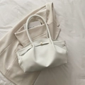 White lychee texture tote bag with minimalist gold buckle and ruched leather details - White