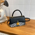 Retro shoulder bag with black leather and leopard print panels and gold padlock - Black