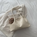 Chic cream tote bag with leather finish and a cute plush bear charm for daily commute - White With Pendant