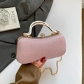 Elegant pink glitter evening bag with gold circular handle and pearl diamond lock detail - Pink