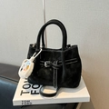 Black matte crossbody bag with white contrast stitching and decorative belt buckle - Black With Pendant