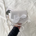 Elegant white handbag with oversized organza bow and decorative pearl handle - White