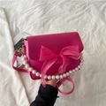 Magenta leather shoulder bag with large fabric bow and pearl handle strap - Rose Red