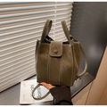 Detail of dark green bucket bag with contrast stitching and metallic button clasp - Green