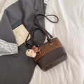 Two-tone suede bucket bag with round handle, crossbody strap and cute bear charm - With Bear Pendant / Brown
