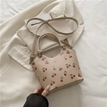 Cream PU tote bag with cherry print featuring double handles and adjustable strap - Khaki