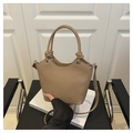 Detail of khaki leather bucket bag with cute cartoon embossing and knotted handle - Khaki