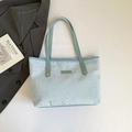 Borsa tote celeste con motivo a stelle e logo in metallo da portare a spalla o a mano - Style Without Charm / Blu