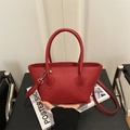 Rote Eimerhandtasche mit Litschi-Muster, Tragegriffen und verstellbarem Schultergurt - Rot