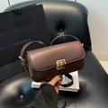 Vintage dark brown crossbody flap bag with gold clasp and smooth glossy leather finish - Brown