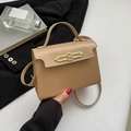 Elegant khaki matte leather trapezoid handbag with gold rotating lock and top handle - Khaki
