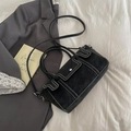 Black rectangle handbag with white contrast stitching and adjustable crossbody strap - Black