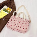 Pink corduroy tote bag with strawberry print, including adjustable strap and outer pockets - Strawberry Pink