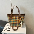 Retro multi-colored woven tote bag with brown leather handles and beaded tassel charm - Yellow Plaid With Charm