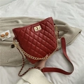Quilted burgundy bucket bag with gold chain strap and metallic twist lock closure - Red