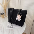 Black canvas tote bag with leather trim and a cute plush cow charm for casual commute - Black With Pendant
