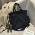 Black canvas tote bag with dual front pockets and green plush frog pendant charm - Black (Frog Charm)