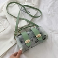 Green leather trim transparent jelly crossbody bag with black graffiti patterns - Green