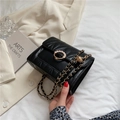 Black quilted chain crossbody bag with pearl buckle and adjustable gold ball - Black