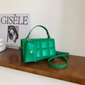 Bright green quilted crossbody bag with a matching small pouch and golden hardware - Green