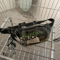 Schwarze transparente Bauchtasche mit BUONING Logo und Karo Anhänger am Wagen - Schwarz Mit Anhänger