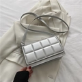 Silver quilted crossbody bag with minimalist plaid pattern and sleek metal strap - Silver