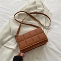 Caramel brown quilted crossbody bag with large grid pattern and slim leather strap - Brown