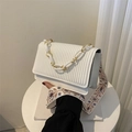 Retro white pleated crossbody bag with embroidered strap and resin chain detail - White