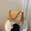 Chic beige crossbody bag with pleated texture and floral embroidery strap - Khaki