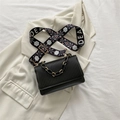 Black textured flap crossbody bag with chunky gold chain and retro floral wide strap - Black