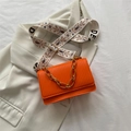 Orange crossbody bag with vertical pleated texture and embroidered floral strap - Orange
