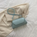 Chic light blue glitter envelope bag with a thin shoulder strap in a minimalist style - Blue