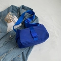 Minimalist blue nylon crossbody bag with matching buckle and adjustable woven strap - Klein Blue