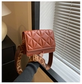 Detailed view of caramel quilted shoulder bag with patterned jacquard wide strap - Brown