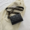 Chic black diamond quilted crossbody bag with stylish gold geometric patterned strap - Black