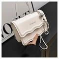 Detail of cream leather crossbody bag with wavy flap and silver chain strap ball - White