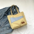 Bolso tote grande de lona de moda con diseño de bloques de color amarillo y azul - Caqui