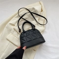 Fashionable black quilted handbag with triangular stitching and gold buckle detail - Black