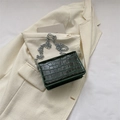 Dark green crocodile embossed square flap bag with thick silver chain on white blazer - Green