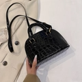 Elegant black crocodile pattern shell bag with golden hardware and adjustable strap - Black
