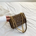 Brown quilted crossbody bag with triangular stitching and a golden chain strap - Brown