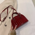 Fashionable dark red crocodile pattern shell handbag with gold hardware and top handles - Burgundy