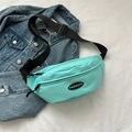 Lightweight mint green sports waist bag with adjustable black strap for casual use - Green