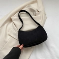 Minimalist black corduroy baguette bag with a stylish crescent-shaped design - Black