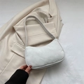 Minimalist white corduroy underarm bag with crescent shape and smooth zipper closure - White