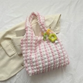 Pink and white checkered bubble bag featuring a yellow plush flower charm and soft texture - Pink